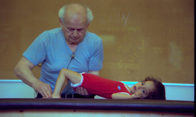 Moshé Feldenkrais and child Amherst 1981