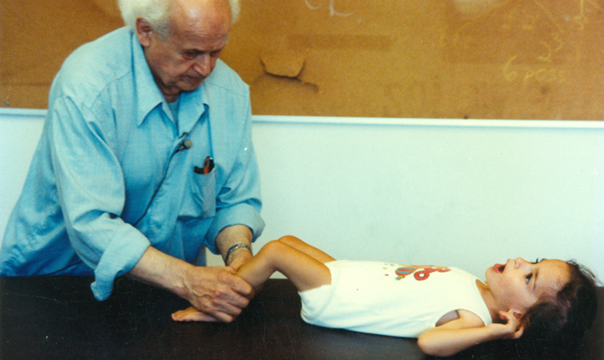 Moshé Feldenkrais and child, Amherst 1981
