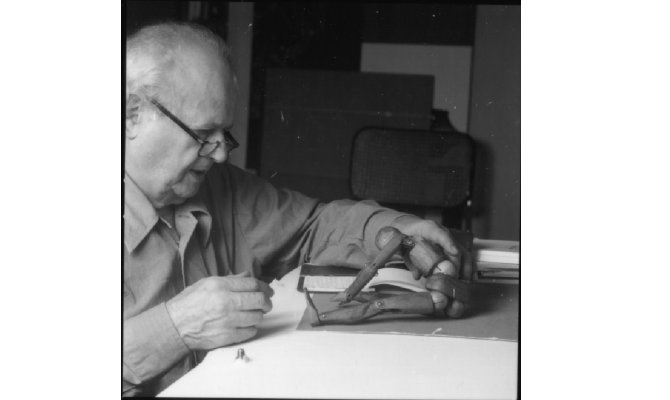 Moshé Feldenkrais working on doll 