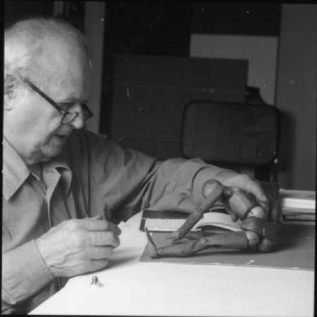 IFF Archive Image: IFF_Moshe_Feldenkrais_working_on_doll